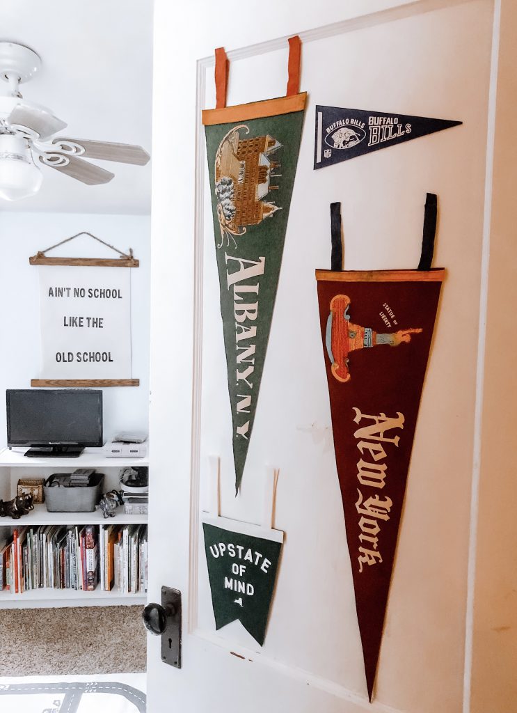vintage pennants are needed for this cool boys bedroom